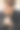 男性穿着黑色西装和眼镜的特写肖像图片下载