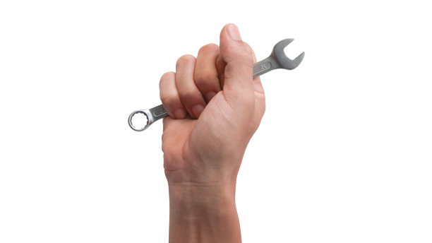 人的手紧握着机械工具和设备图片下载