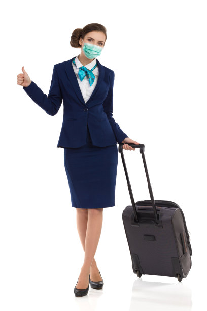 空姐提着行李袋，竖起大拇指图片下载
