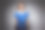 正面肖像，一个开朗的女人与姜黄色头发和化妆在蓝色的衣服，孤立在一个深灰色的背景。图片下载