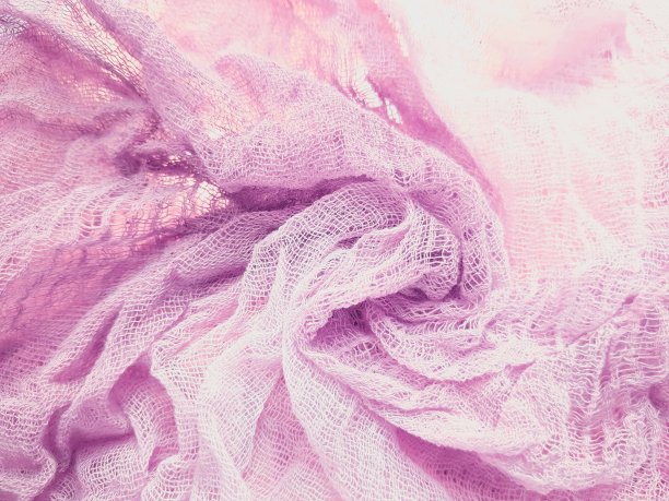 粉红色纹理皱巴巴的织物背景图片下载