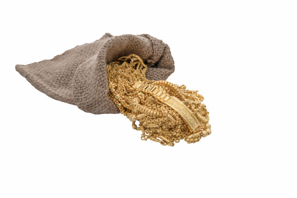 金首饰从袋子里倒出来堆在一起图片下载