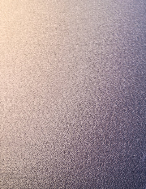 背景-高海拔的航拍照片的海洋与涟漪的水。图片下载