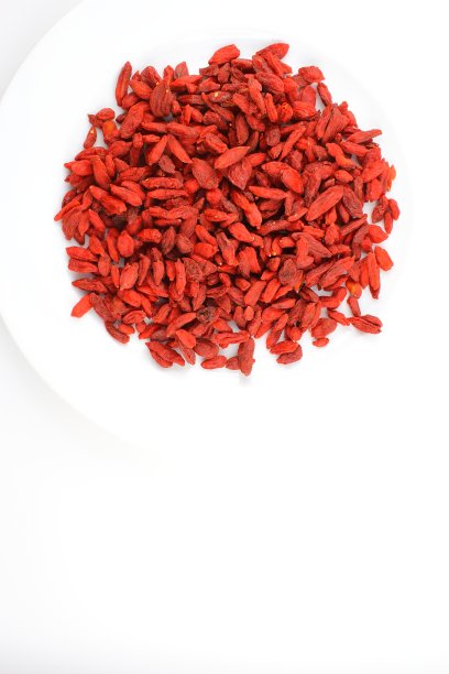 干枸杞在白色盘子食物背景纹理与复制空间图片下载