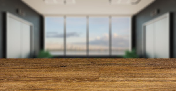木质桌子背景上模糊的内部。大厅有一个大窗户。商务中心的接待处。电梯门。黑暗装饰墙. .三维渲染图片下载
