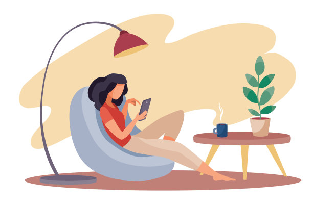 女孩舒服地坐在扶手椅上工作图片下载