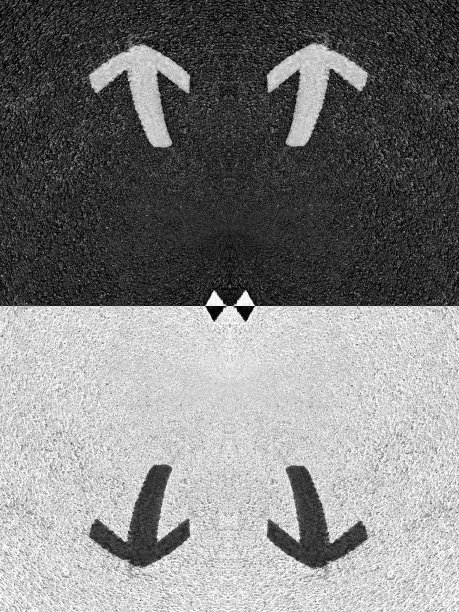 明亮的黄色笔直的方向箭头画在主要的道路标记上图片下载