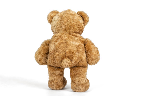 白色背景上有阴影的泰迪熊图片下载