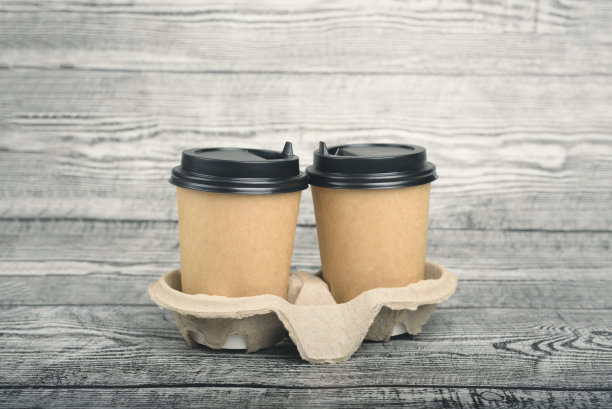 木背景上零浪费咖啡纸杯。图片下载