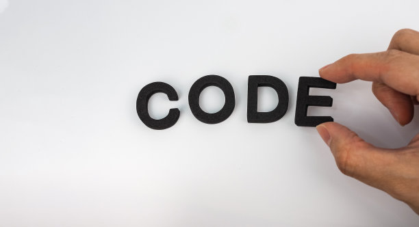 代码文本与手握字母图片下载