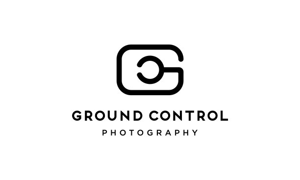 字母g和字母c带有相机标志的设计理念图片下载