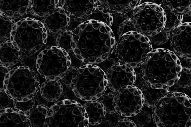 抽象的背景。闪亮的黑球和洞从两边穿过，在黑暗中漂浮。许多黑色球体的图案。图片下载