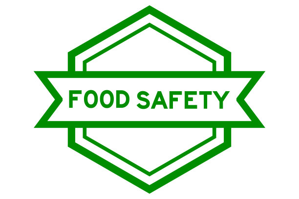 六边形复古标签旗帜在绿色与字食品安全在白色背景图片下载