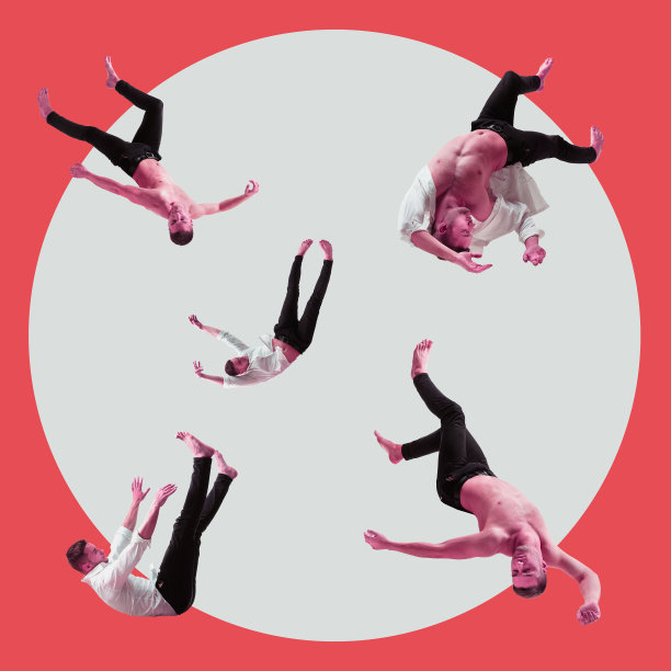 空中的美丽。全长摄影棚拍摄的有吸引力的年轻男子在空中盘旋，保持眼睛闭着图片下载