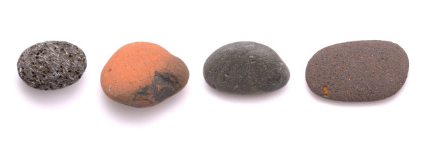 各种颜色和纹理的鹅卵石孤立在白色的背景图片下载