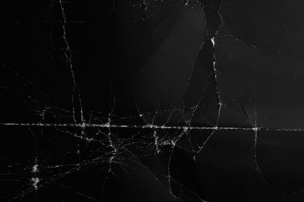 皱巴巴、磨损的黑黑的纸面图片下载