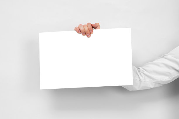 手持从顶部白板与复制空间在白色背景。图片下载