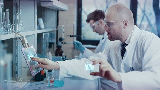 研究DNA突变的研究小组。虚拟触屏图片下载