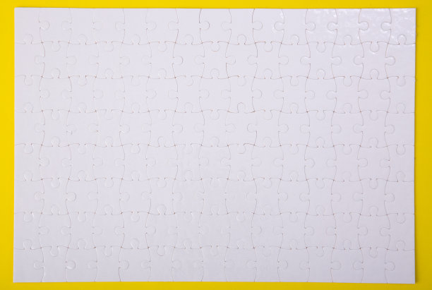 白色拼图图案背景。拼图图片下载