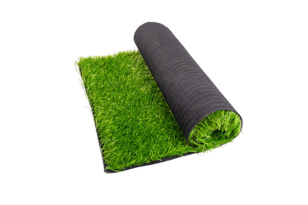 人造草皮，涂层，一卷人造绿草孤立在白色背景上图片下载