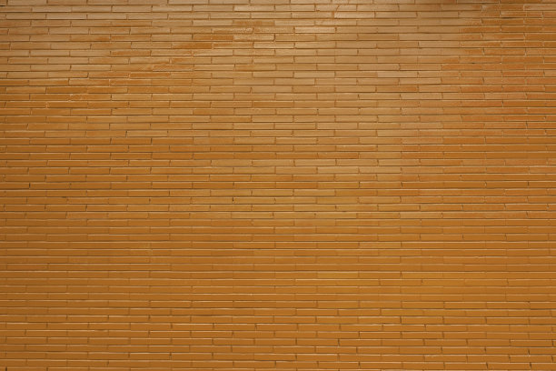 红色砖墙和灰浆面。纹理的背景图片下载