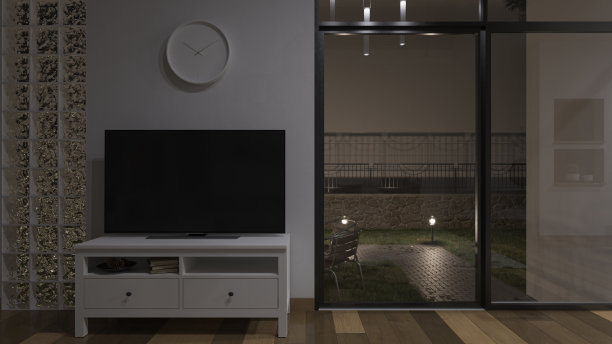 在一个有玻璃门的照明房间里的电视的夜间渲染图片下载