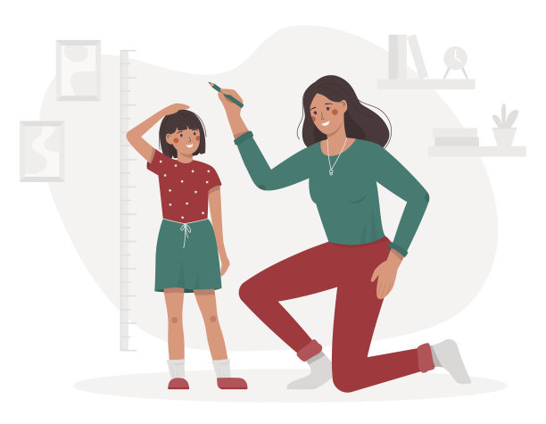 母亲在房间里量孩子的身高图片下载