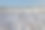 泡沫的海岸。涌潮。海滩。无聊的海。图片下载