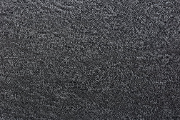 接近黑色皮革和纹理背景。图片下载