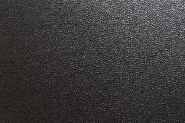 接近黑色皮革和纹理背景。图片下载