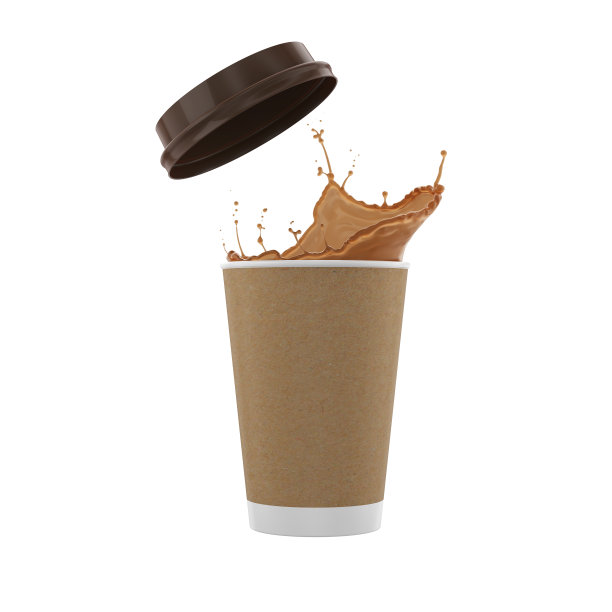 咖啡液溅到纸杯上。图片下载