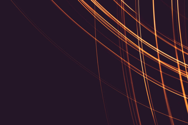 在夜晚用灯光作画，明亮的橙色线条在黑色的背景上。光源在帧内移动。图片下载