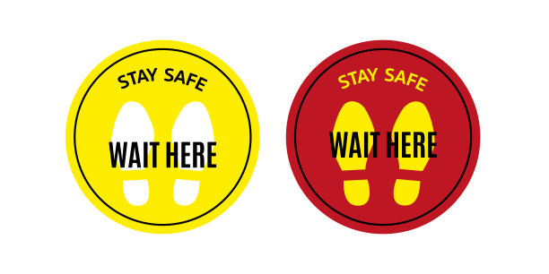请在这里等待社交距离圆形地板标记贴纸图标mit文本和鞋印。矢量图像。图片下载