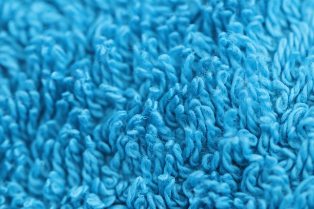 蓝色毛巾的宏。图片下载