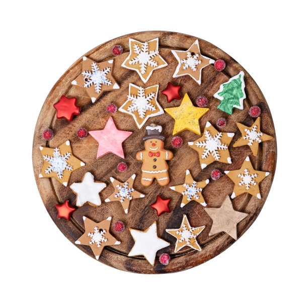 圣诞饼干在盘子上孤立的白色背景图片下载