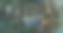 在火车站使用智能手机佩戴口罩的妇女的危险标志和Covid-19细胞图片下载