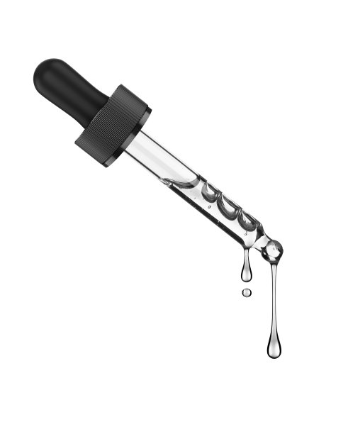 化妆品移液管与一个接近孤立的白色背景图片下载