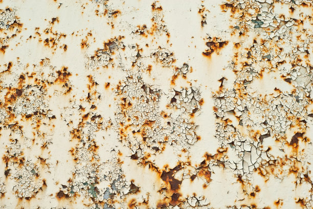 旧金属栅栏的纹理。被黄色油漆划伤的金属板。图片下载