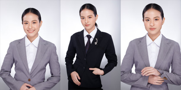亚洲妇女黑头发灰色西装外套。办公室女孩摆出许多姿态图片下载