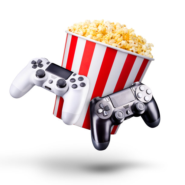 飞行爆米花和视频游戏操纵杆游戏手柄隔离在一个白色的背景图片下载