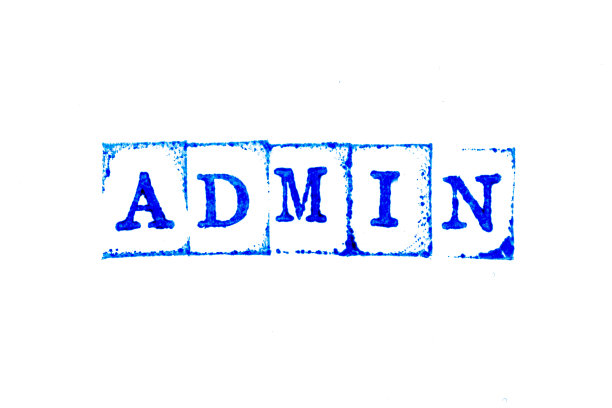 蓝色油墨的橡皮图章在word管理白纸背景上图片下载