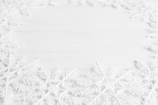 雪花在雪的背景上。空间的文本。图片下载