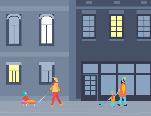 人们在冬城的夜晚行走在街道上图片下载