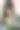 美丽的白人女孩在粉红色的墙拿着白色的花图片下载