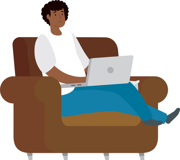 一个黑人坐在沙发上用笔记本电脑与世隔绝图片下载
