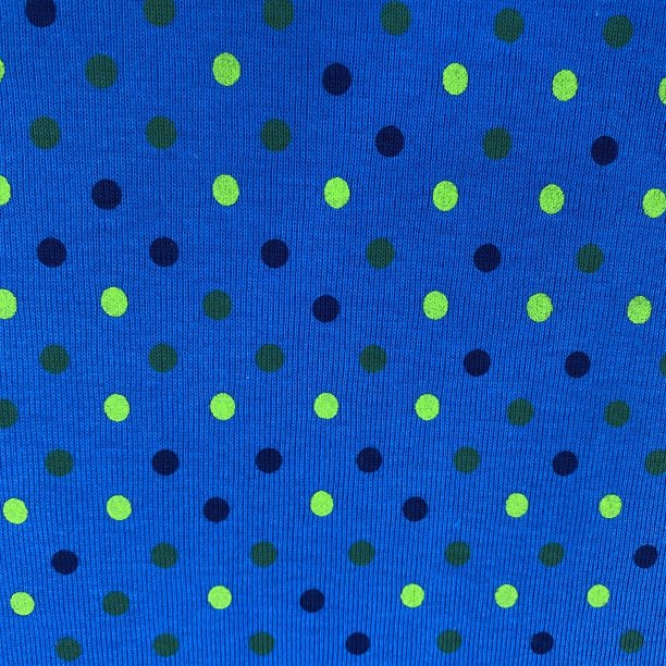 蓝色棉布罗纹针织物纹理与石灰点图片下载