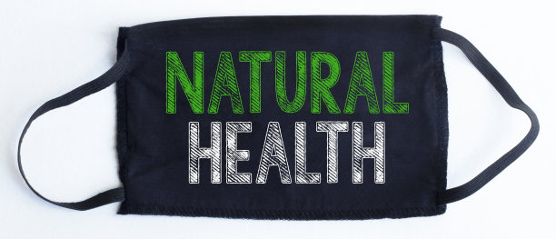 黑色一次性防护口罩与自然健康文字在黑色背景。图片下载