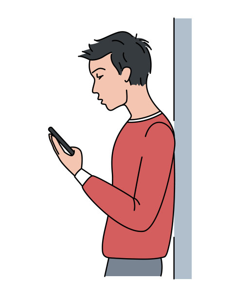 男人靠在墙上看电话。孤立在白色背景上。图片下载