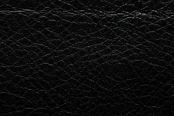简单的黑色真皮背景。高质量的纹理在极高的分辨率。图片下载