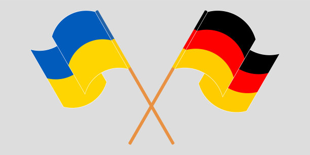交叉挥舞的乌克兰和德国国旗图片下载